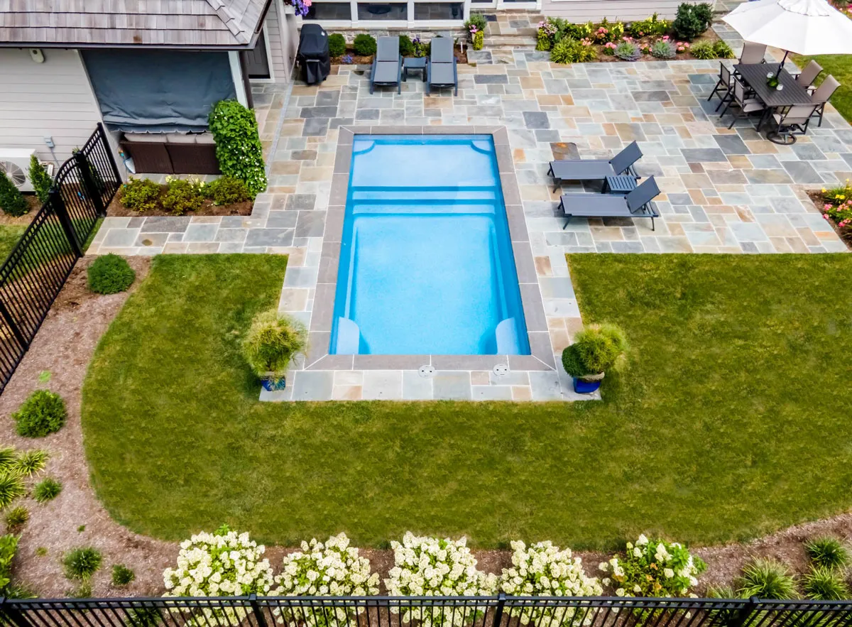 Latham Corinthian 12 pool viewed from above, with a wide entry ledge and steps